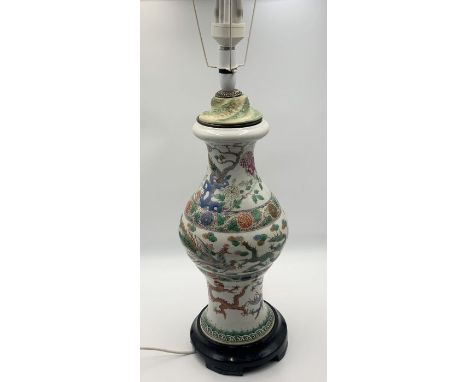 A Famille Verte Chinese vase which has been converted to a lamp 