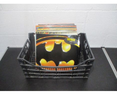 A collection of 12" vinyl records including Prince, The Police, Elton John, Slade, ELO, Cher, Elvis Presley, The Beach Boys, 