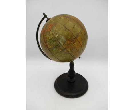 An antique Philip's Educational Terrestrial globe - diameter approx.14cm, height 27cm