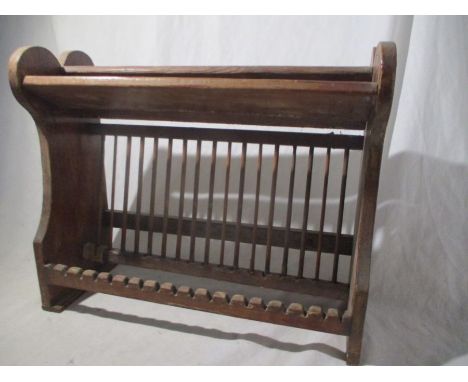 A vintage pine hanging plate rack