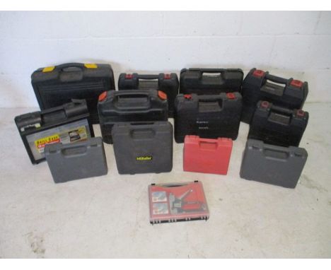 A collection of various power tools including a Pro Router, Parkside Jigsaw, Black &amp; Decker Drill, Parkside Engraver, DeW