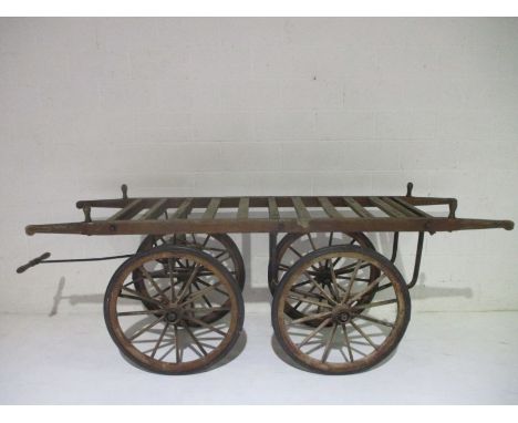 A Victorian funeral bier with cast iron frame with ladder rack coffin rack believed to be formerly from Axminster cemetery ch