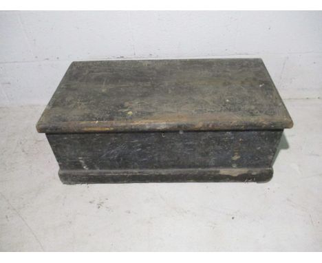 A vintage wooden storage trunk
