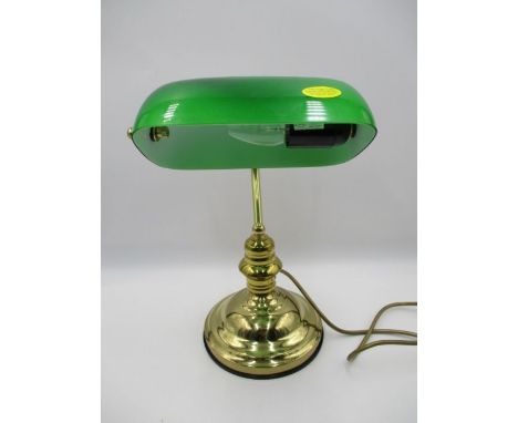 A modern bankers lamp with green shade