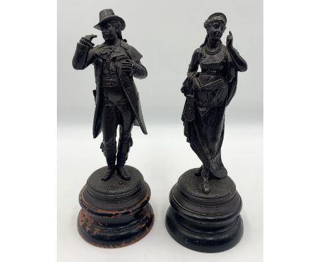 Two spelter figures on wooden bases 