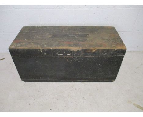A vintage wooden storage trunk