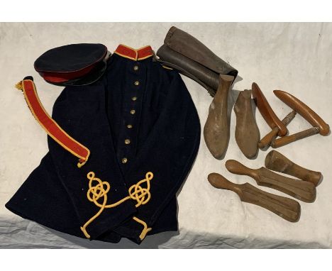 A WW1 navy, red and gold Army jacket and hat along with a collection of antique shoe lasts 