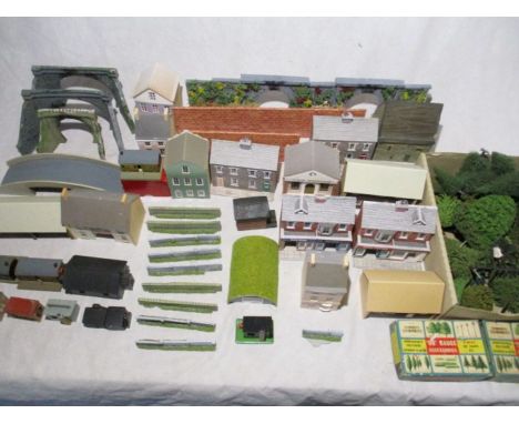 A collection of model railway buildings and scenery including signal box, shops, pub, houses, post office, tunnels, fencing, 
