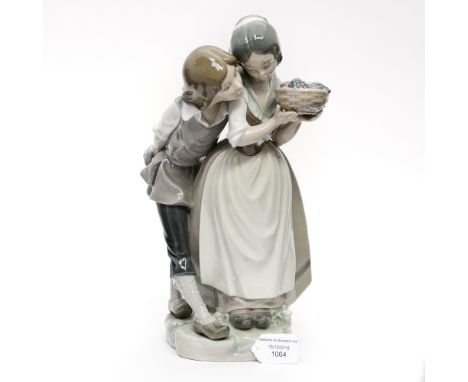 Lladro figurine of boy and girl with basket of fruit