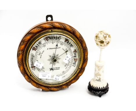 Oak wall dial barometer, together with Ivory puzzle ball on stand