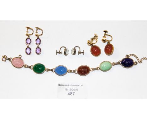A pair of 9ct gold and amethyst drop earrings (screw fittings); a pair of moonstone screw back earrings; a pair of 12k rolled