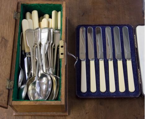 A cased set of six ivorine handled tea knives and a small oak box containing EPNS spoons and ivorine handled table knives (2)