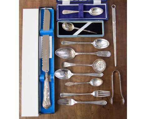 A collection of silver including two christening fork and spoons sets, George III Edinburgh silver dessert spoon, sifting spo