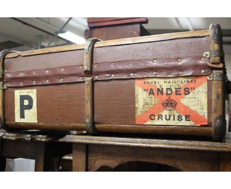 An early 20th Century canvas and wood bound trunk, bearing a label reading 'Royal Mail Lines'