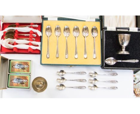 A cased set of six silver teaspoons; six Continental silver teaspoons stamped 80; EP egg cup and spoon cased; Thai brass and 