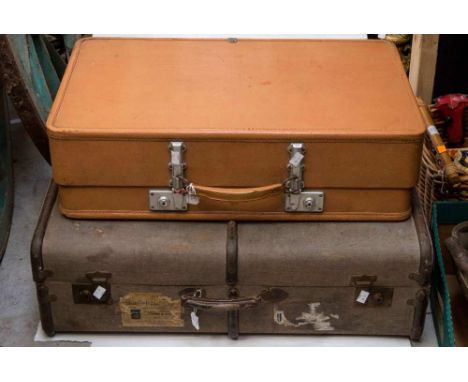 A large 1920s trunk style suitcase; together with a 1940s tan expandable suitcase in a hardboard used in World War Two 