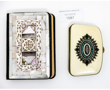 A late Victorian ivory purse, with white metal enamel and turquoise inlay, initialled A.B.S., with a worn sixpence and a moth