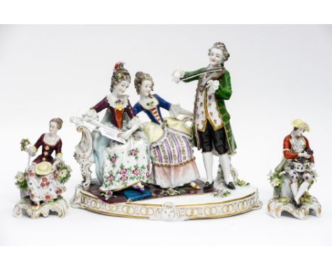 A Continental porcelain figure group of two ladies seated on a bench listening to violinist, base marked M; together with a p
