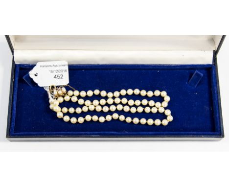 A string of pearls, 9ct. gold clasp amethyst and pearl flowerhead cluster clasp, approx 18 inches