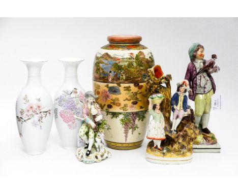 A Samson copy of Chelsea man playing the bagpipes, with a boy with his Hawk, a Staffordshire flatback and three Chinese vases