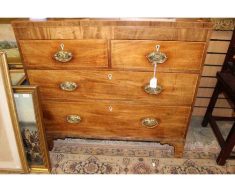 A George III mahogany chest of drawers, fitted with two short over two long drawers, retaining original handles and locks, ra