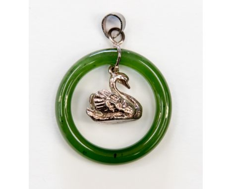 A jade ring and silver swan pendant