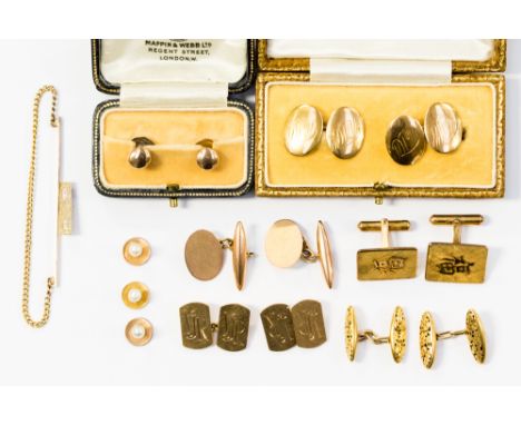 A pair of 14ct gold studs, 2.4 grams approx; a pair of yellow metal cufflinks, unmarked, 8.4 grams approx; both in Mappin and