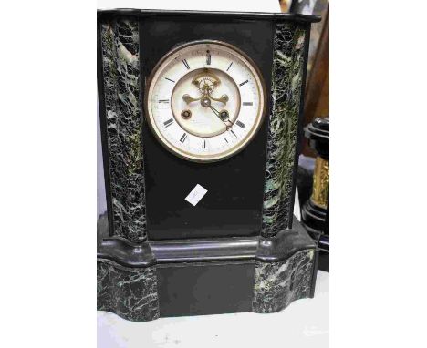 A 19th Century French marble mantle clock, white enamel dial and chapter ring with skeleton escapement, green and black empir
