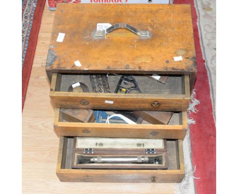 A 19th Century tool chest, oak with three drawers, with brass inset handles, a leather carry handle, tools included in the dr