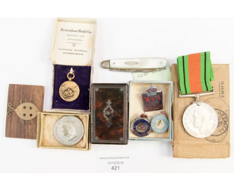 A Defence medal with other assorted medals, a mother of pearl handled silver blade pen knife, snuff box, etc 