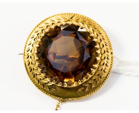 A Victorian citrine and yellow metal target scarf pin, the centre citrine approx 11.5mm diameter, the surround with applied R