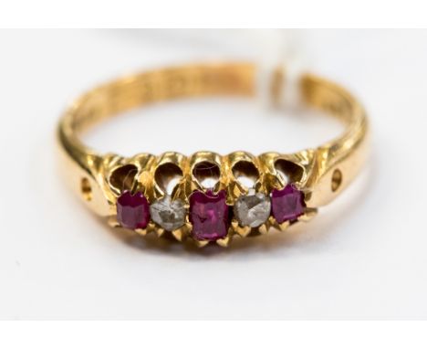 A ruby and diamond ring on 18ct. gold, ring size M, approx weight 3.5 grms 