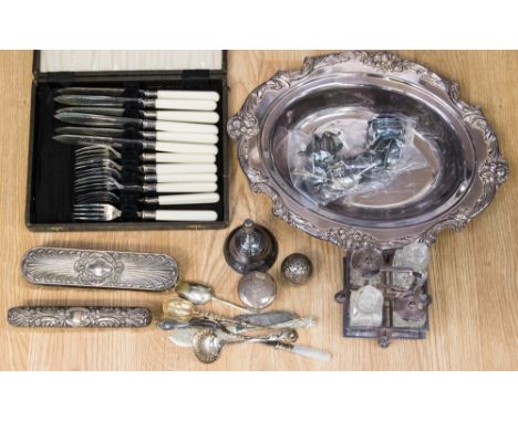 Two silver brushes; a silver topped glass jar; white metal egg pepperette; EPNS cruets; entree dish; knife and fork set; sift