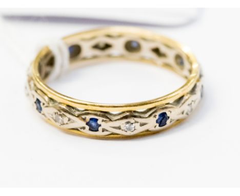 An 18ct yellow and white gold eternity ring sapphire and diamond clip set, size R 1/2, gross weight approx 3.9 grms