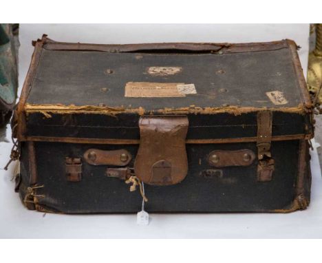 An early 1900s black trunk (handles each end) with original stickers when used over the years when it was in service (1) 