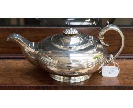 A George IV silver teapot, in a squashed ovoid form, letter inscribed 'P', hallmarked to base London 1810, makers mark Henry 