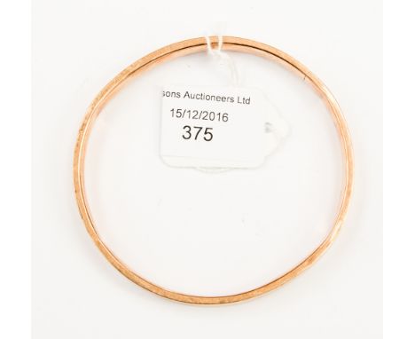 A 9ct rose gold slave bangle, gross weight 14.8 grams approx 