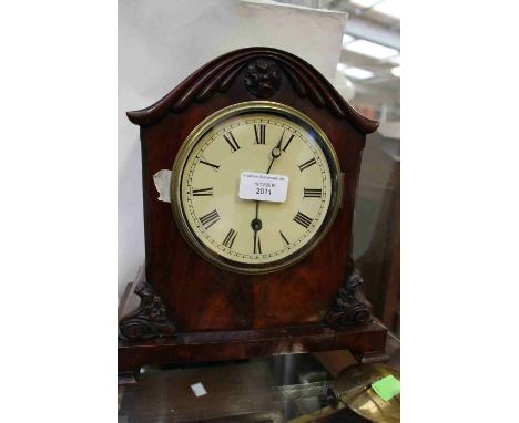 Victorian bracket clock with round face and Roman numerals