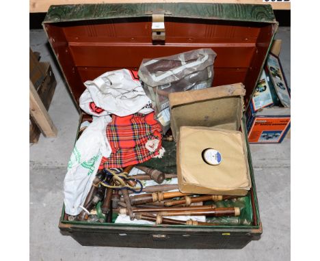 A tin trunk containing bagpipes, etc