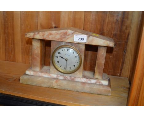An Art Deco marble cased eight day mantel clock 