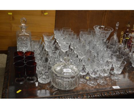 A quantity of various crystal glass and other drinking glasses; a decanter and stopper; a pedestal vase etc. 