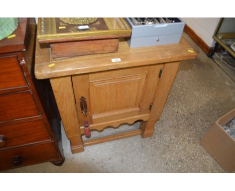 A good quality light oak side cupboard 