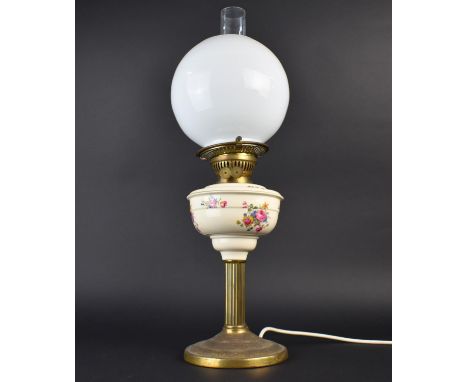 A Table Lamp in the Form of a Brass Oil Lamp with Ceramic Base having Globular Shade and Chimney