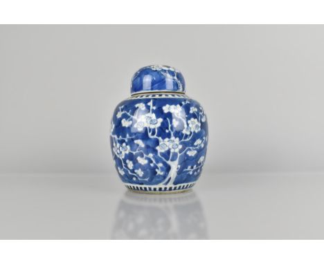 A Chinese Qing Dynasty Porcelain Blue and White Prunus Pattern Ginger Jar and Cover with Four Character Mark for Kangxi Insid
