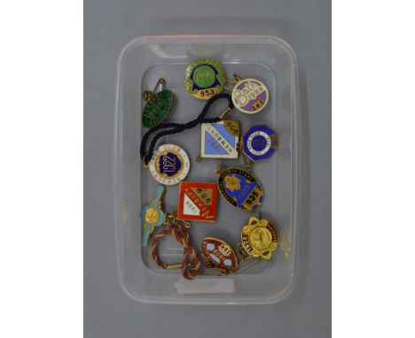 11 vintage enamel Horse Racing badges ranging from the 1920s-1940s