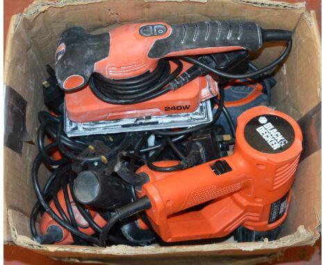 A mixed box of Black & Decker power tools