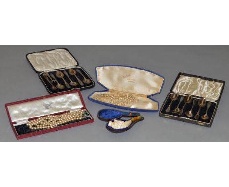 A mixed lot of collectables including two hallmarked silver boxed spoon sets and pair of sugar tongs together with a cased me