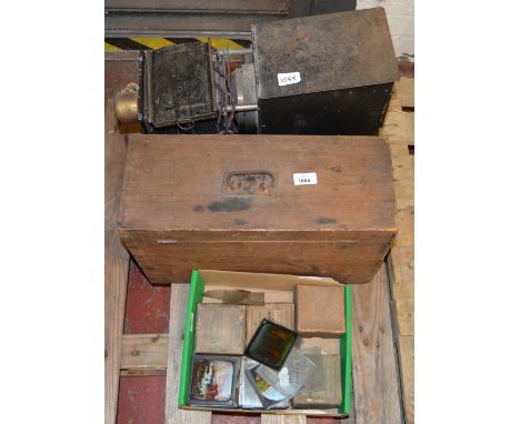 2 Magic Lantern projectors together with a collection of assorted slides.