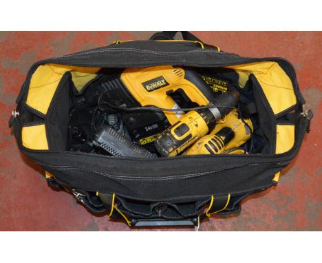 A DeWalt tool bag containing various DeWalt drills and power tools