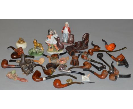 A collection of pipes and pipe stands etc.